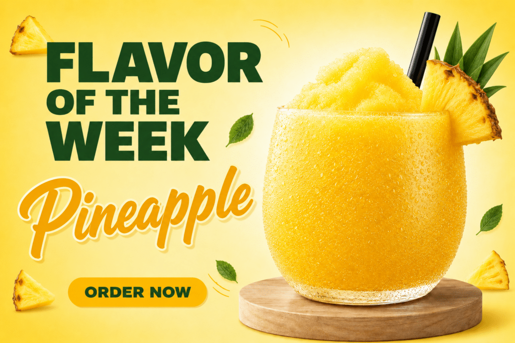 Promo banner advertising 'Flavor of the Week' Pineapple drink with a pineapple-filled glass on a wooden stand.